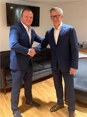 Ioakeim Tsanis, CEO of Hellenic Radio Services and Erik Ceuppens, CEO Marlink Group, shake hands on Marlink's acquisition of the satellite communications business of Hellenic Radio Services. - Credit: Marlink