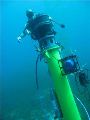 A diver completes the installation of Sentinel sonar heads and Scylla underwater loudhailers.